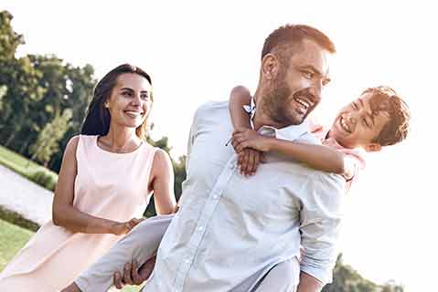 Family playing near home